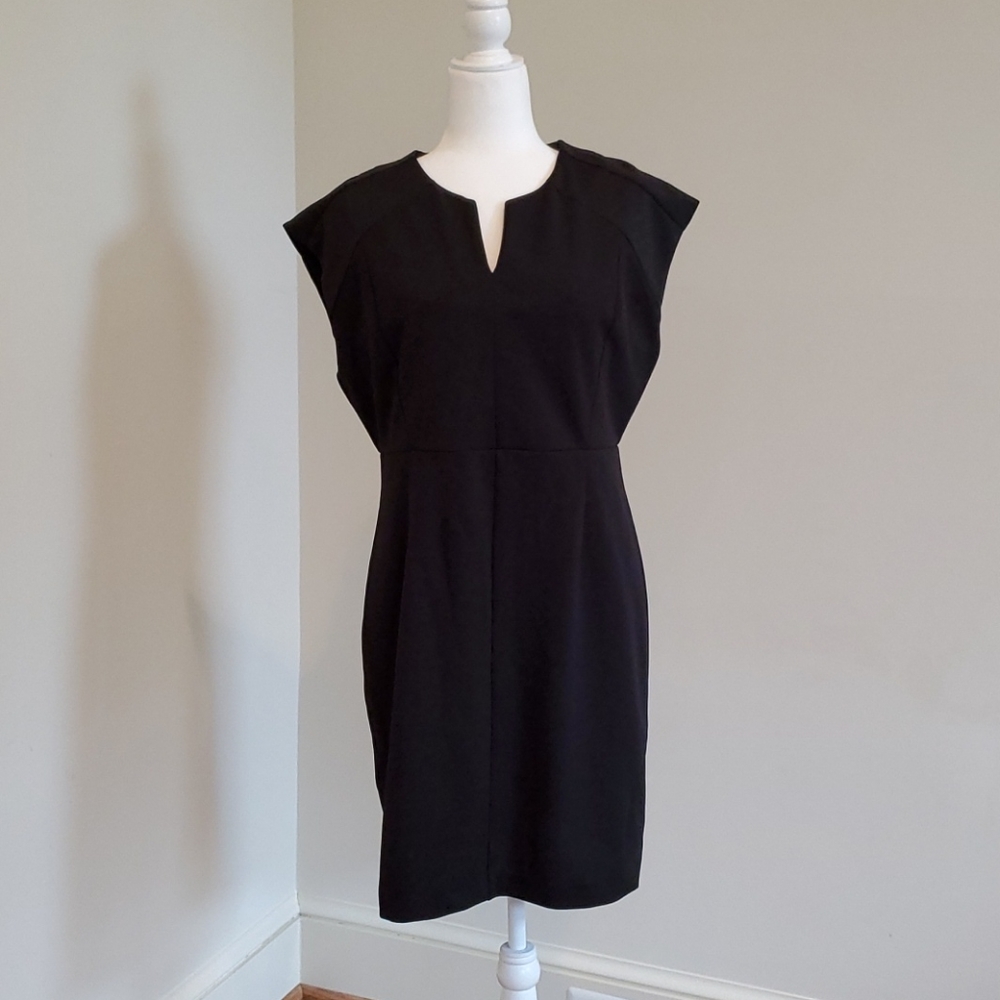 Never worn black dress Size L